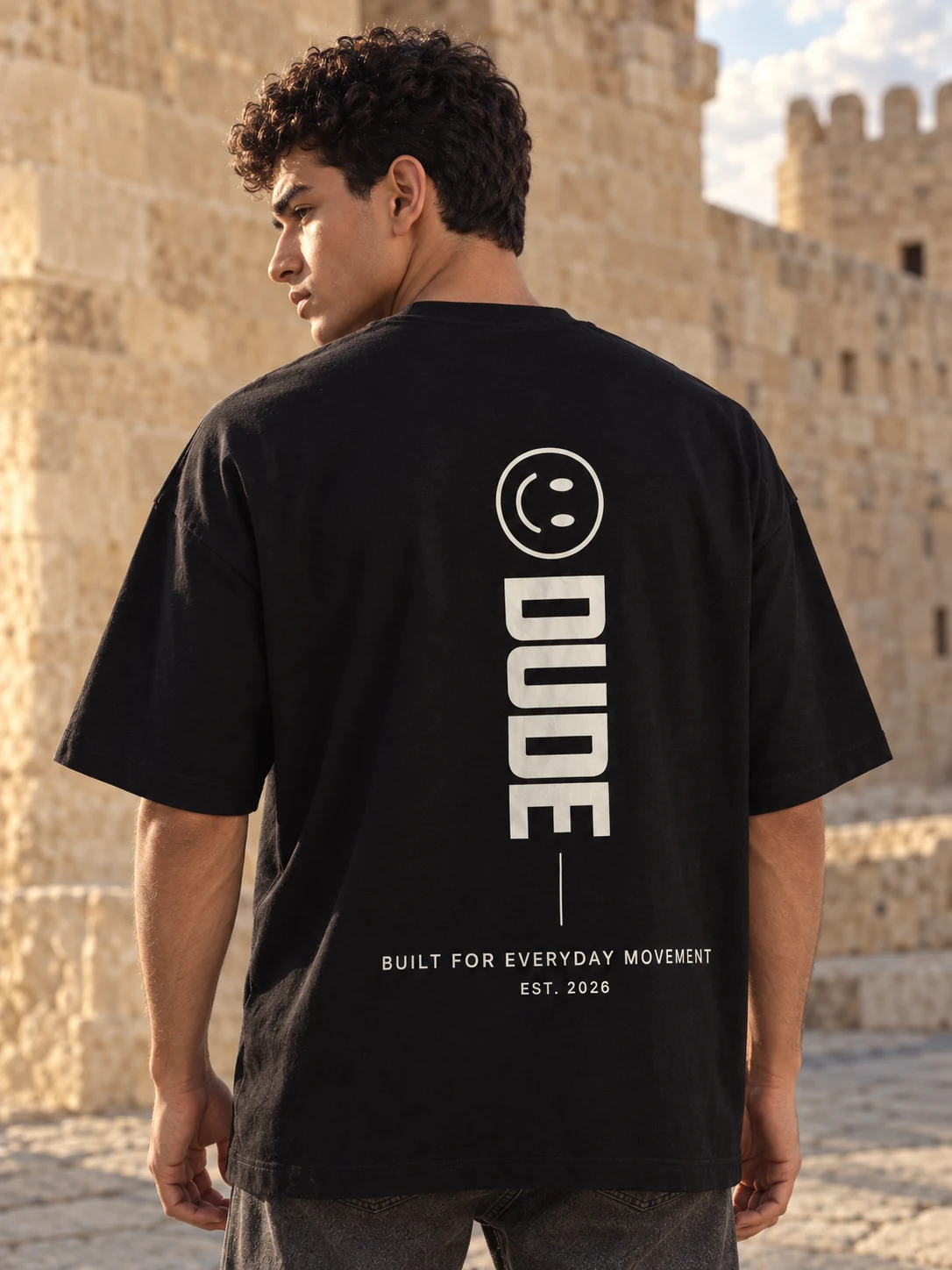 Close view of the black DUDE T-shirt back print
