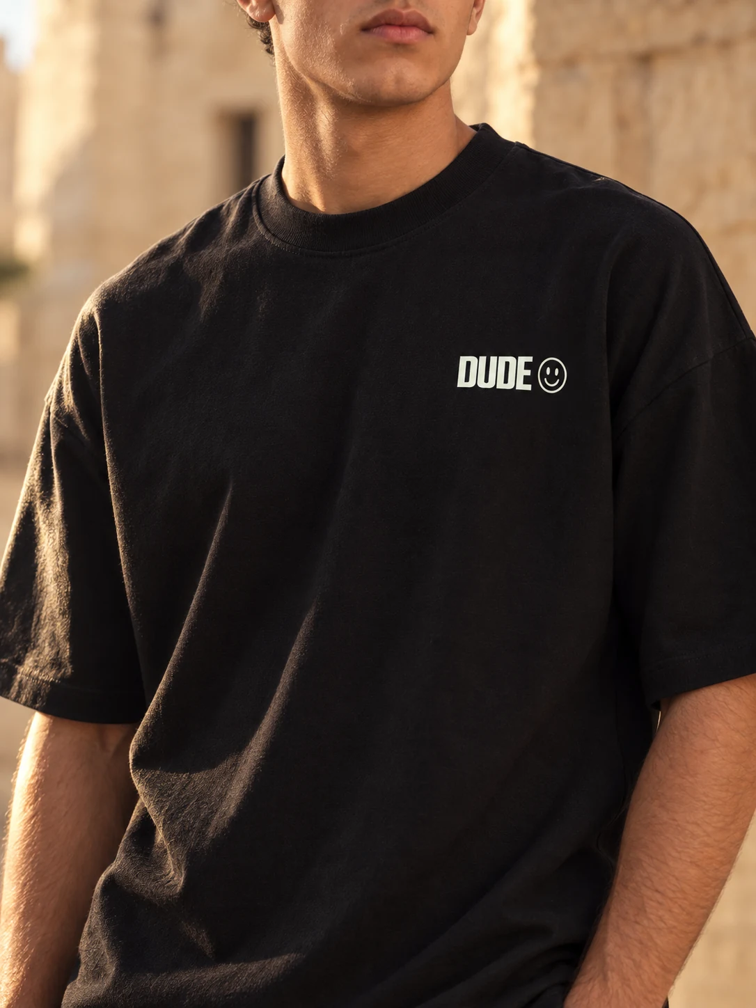 Black DUDE T-shirt chest logo and fabric detail