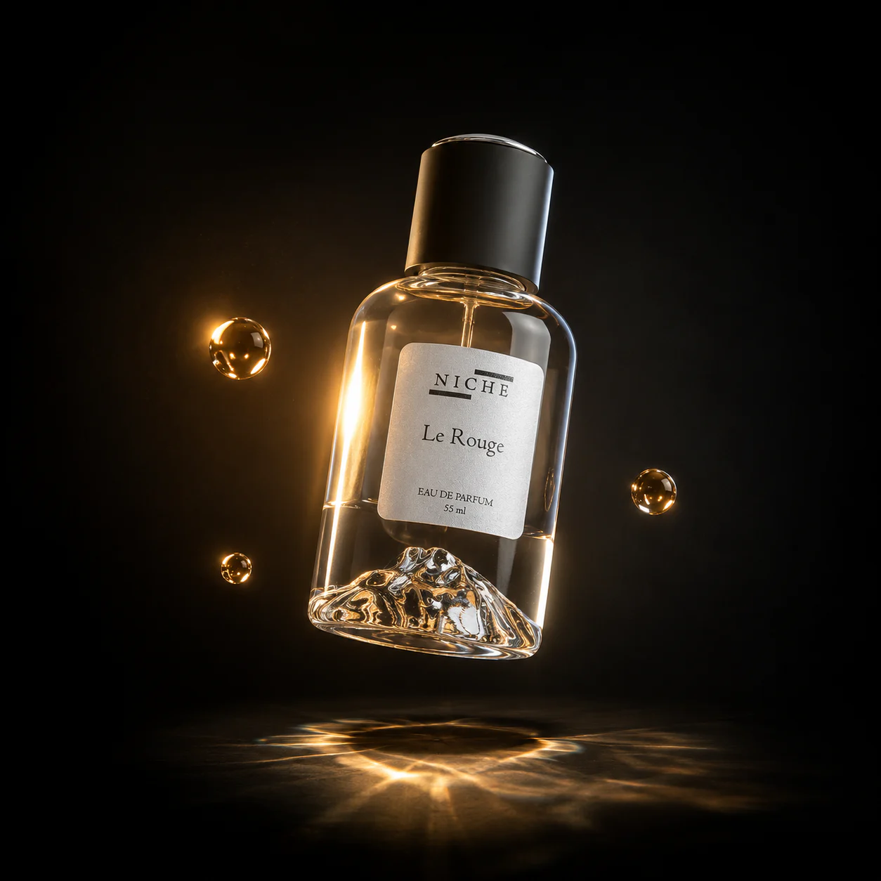 Le Rouge perfume bottle floating above a dark reflective surface in warm amber light