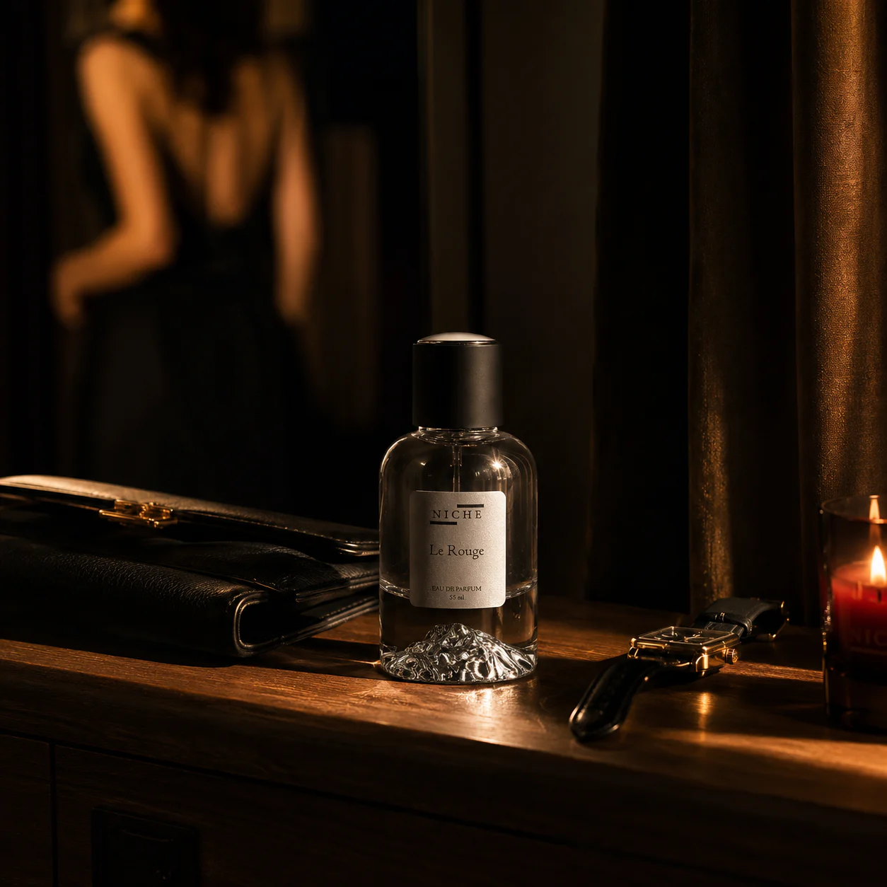 Le Rouge perfume bottle on a dark vanity in cinematic evening light