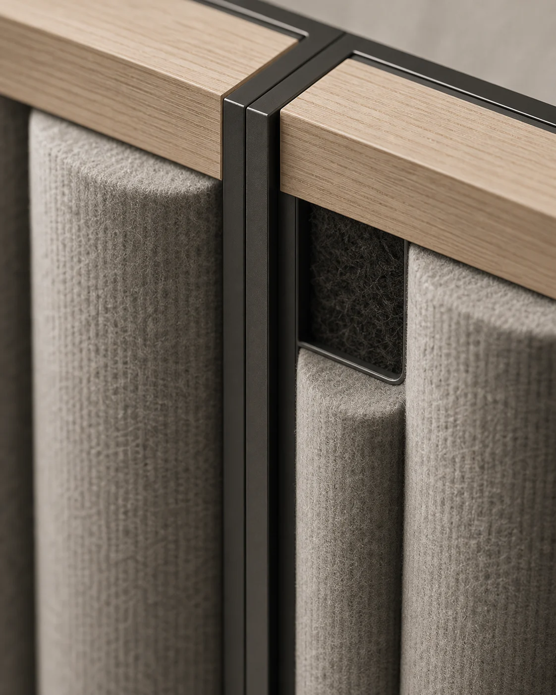 Macro view of the warm-grey felt texture and convex flute edge on SONARE Quietform P1