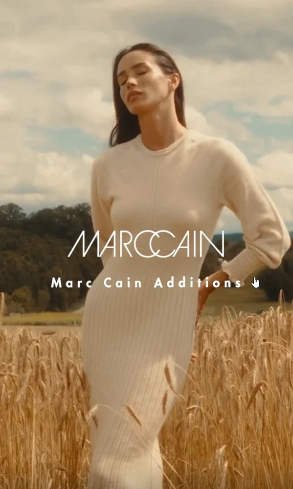 Wheat-field fashion campaign reference used for the visual direction