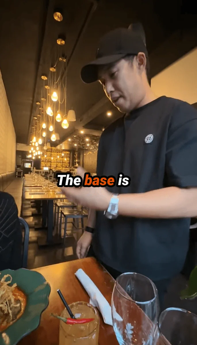 Original phone footage of a bartender preparing a drink