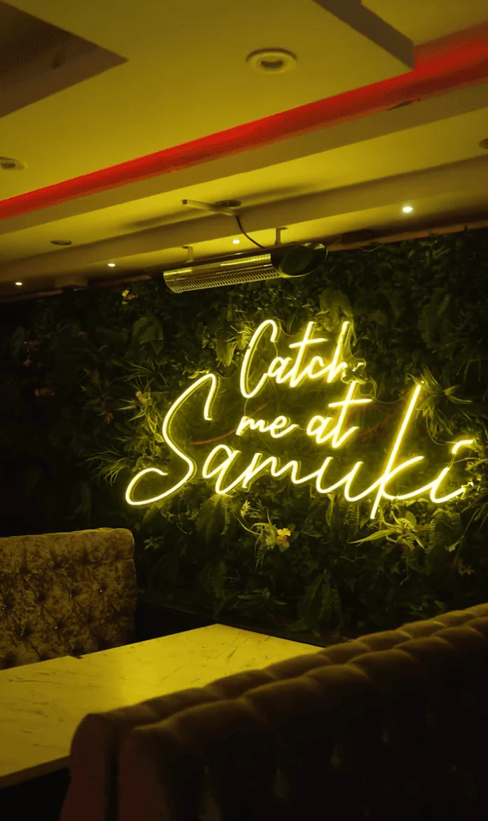 Original Catch Me at Samuki neon sign used as a source reference