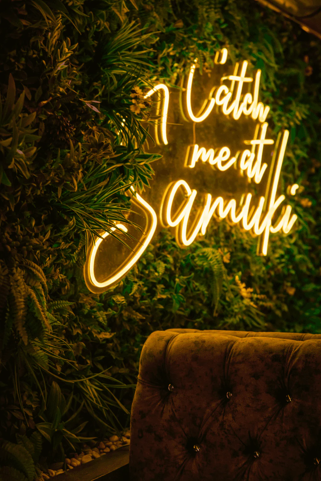 AI-generated cinematic close-up of the Catch Me at Samuki neon sign